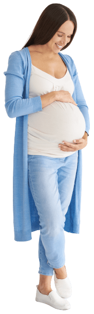 pregnant woman looking at belly
